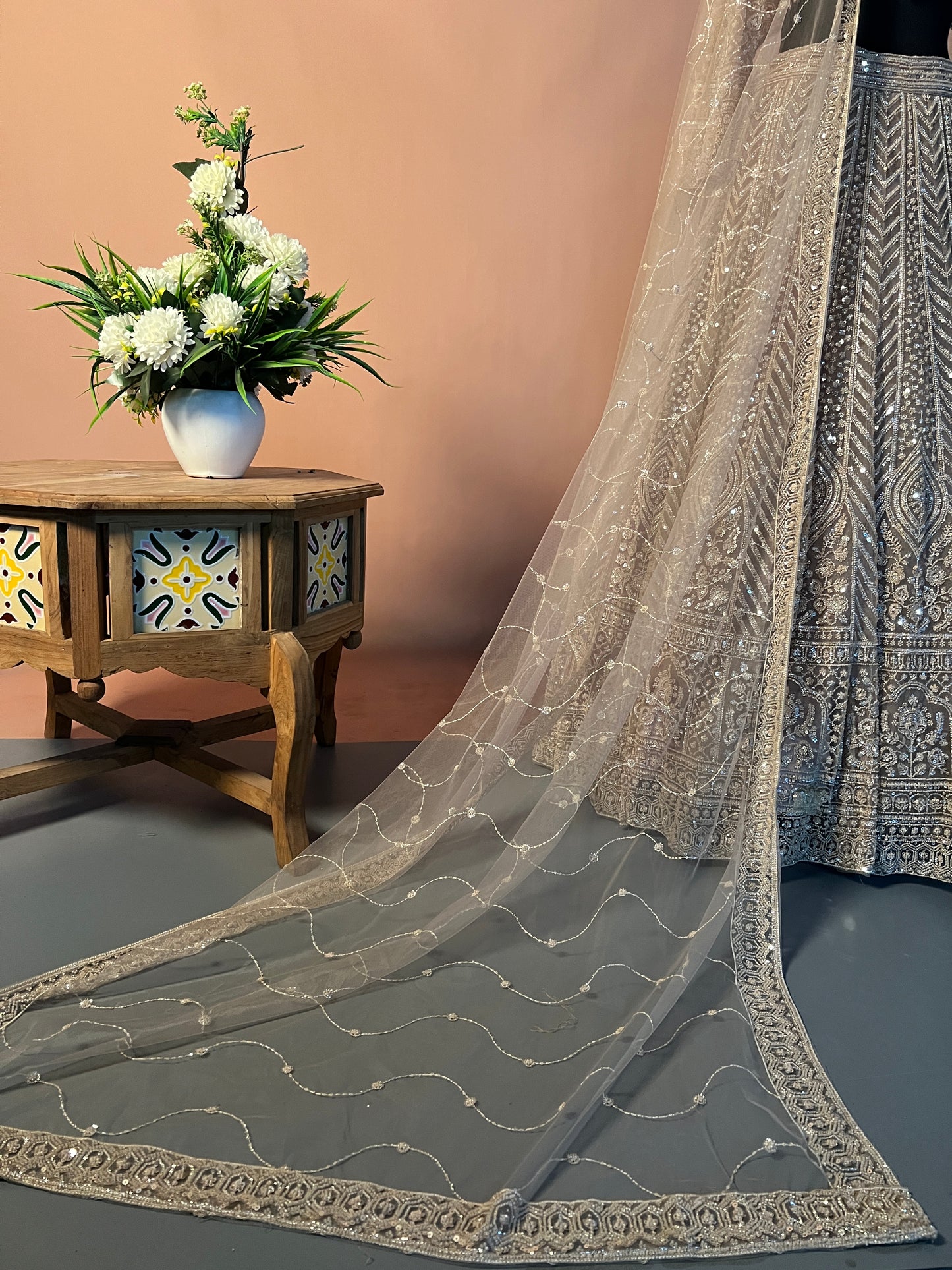 Beige Designer Lehenga with Heavy Sequin & Tassel Embroidery
