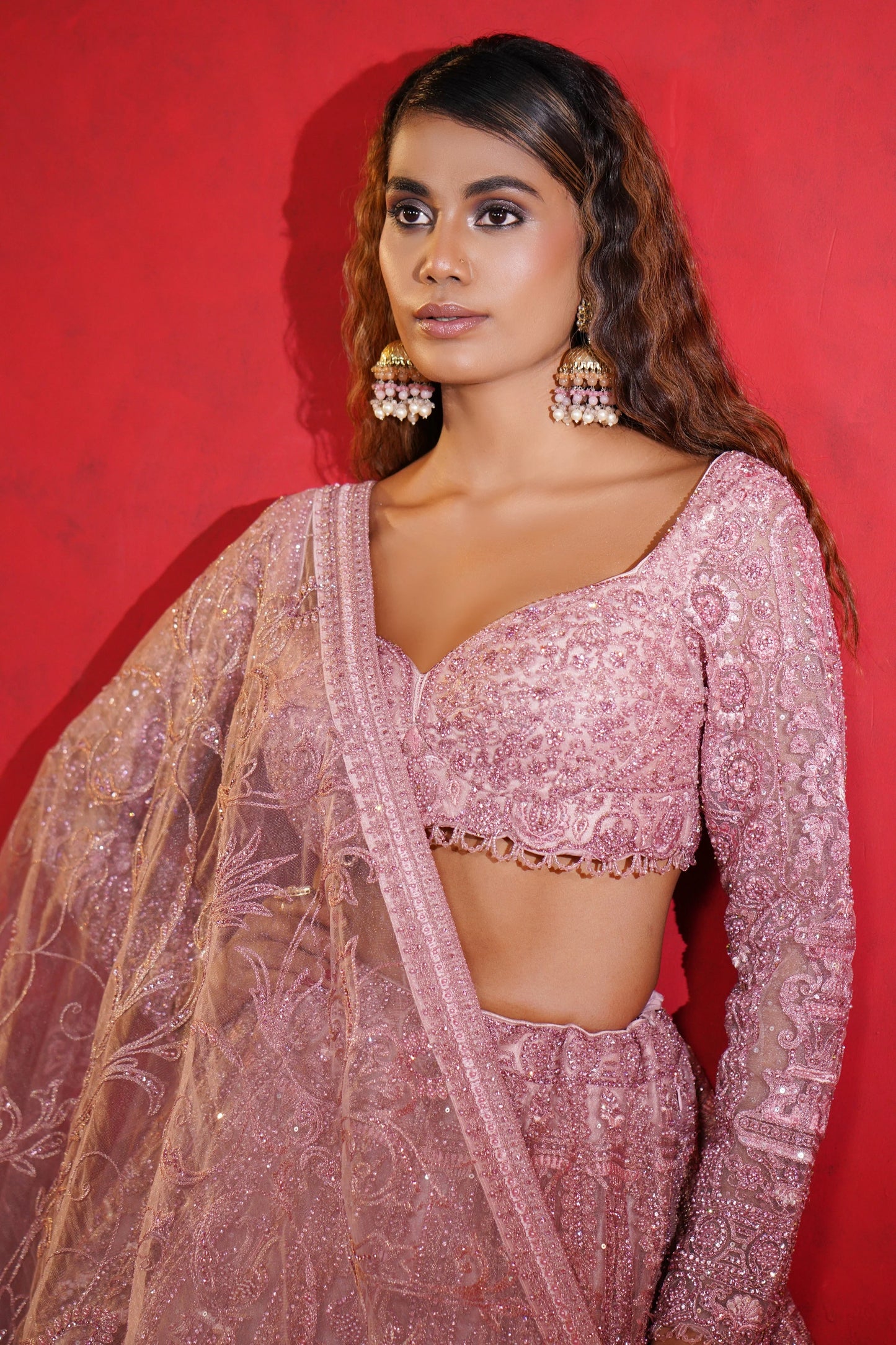 Blush Pink Net Lehenga with Intricate Sequin Embroidery