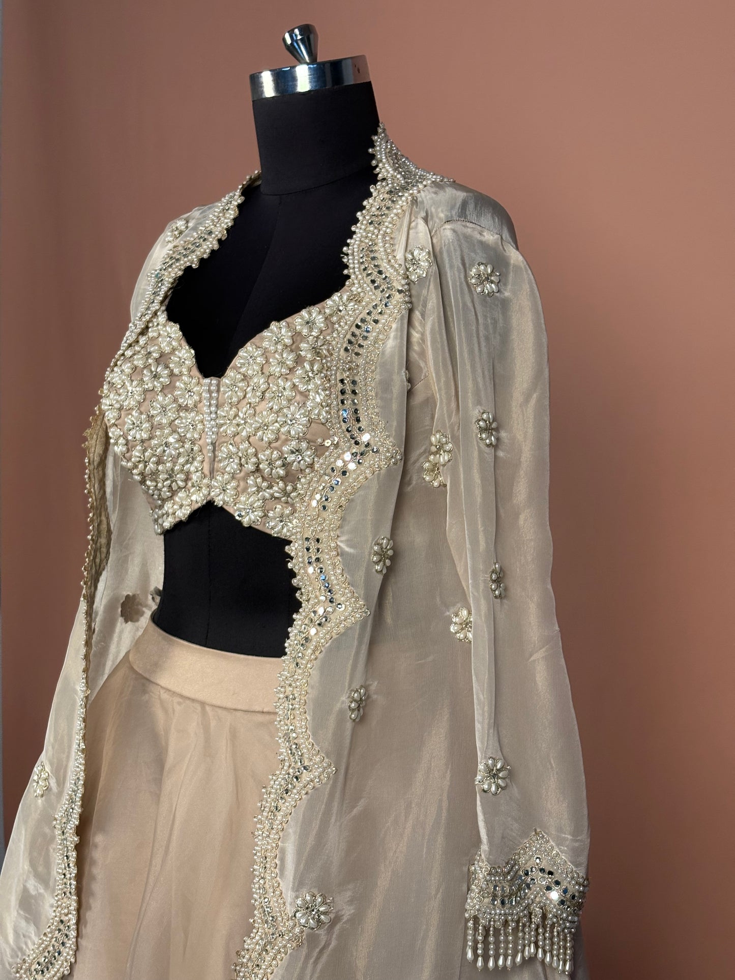 Champagne Gold Pearl Embellished Lehenga Set with Cape Jacket