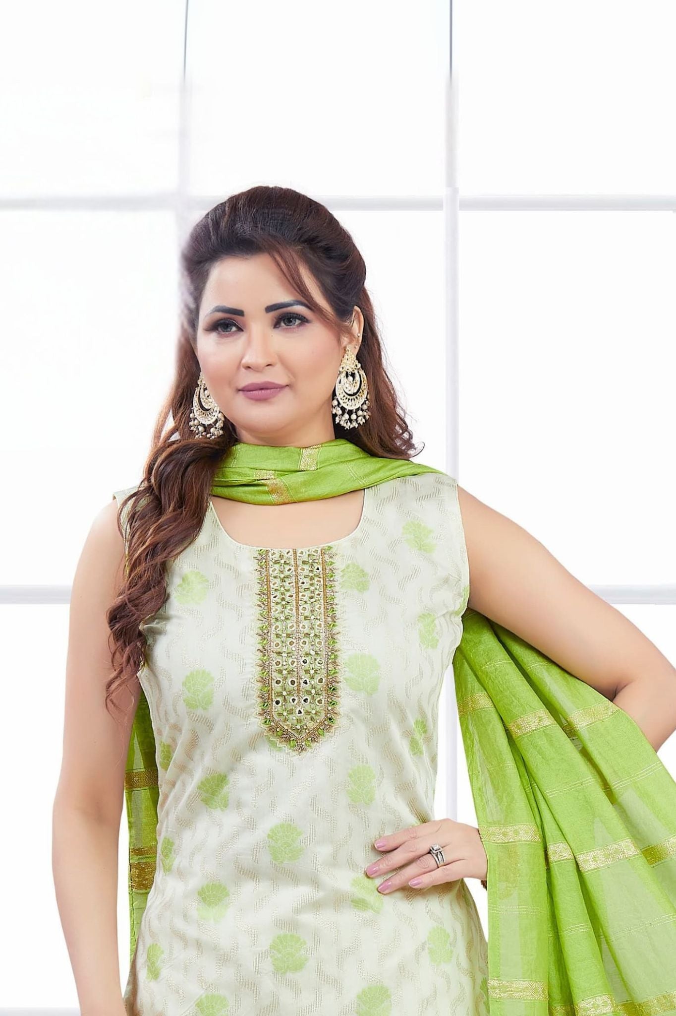 Chic Green & Cream Sleeveless Salwar Suit with Zari Embroidery and Striped Dupatta