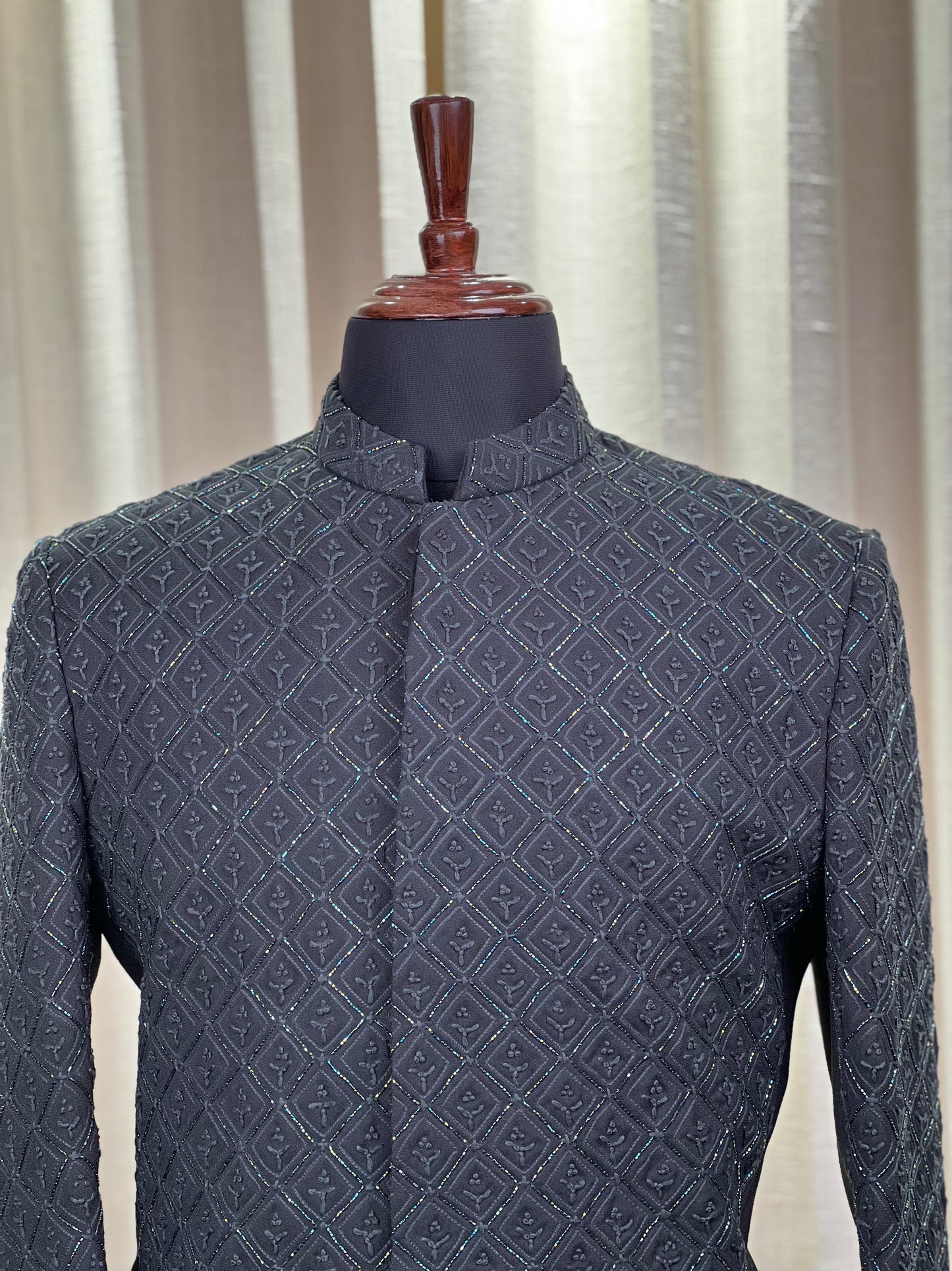 Emerald Green Textured Jodhpuri Suit with Subtle Geometric Embroidery