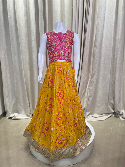 Girls Traditional Bandhani Lehenga Choli in Yellow & Pink