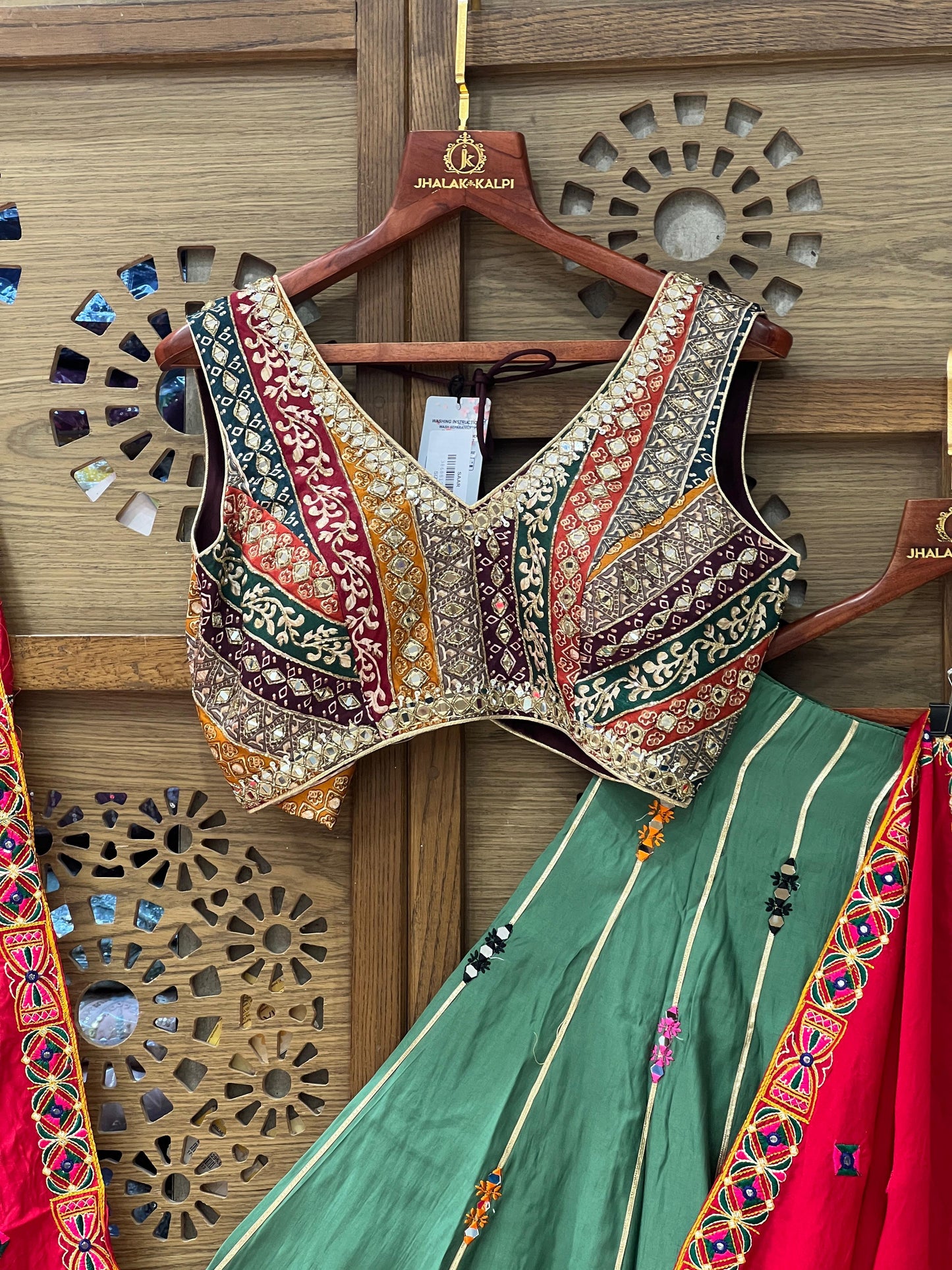 Green Embroidered Chaniya Choli with Red Dupatta and Mirror Work Blouse