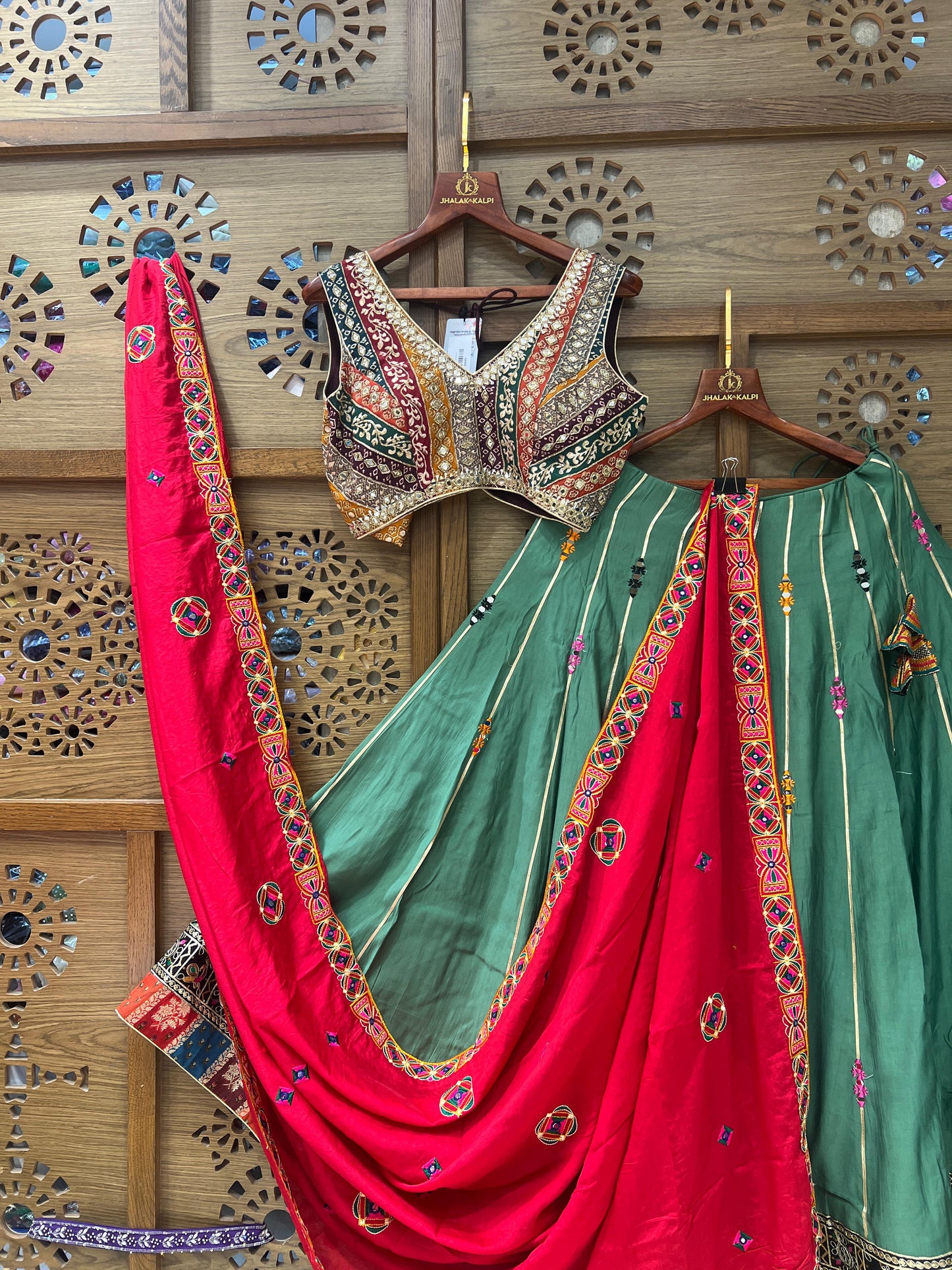 Green Embroidered Chaniya Choli with Red Dupatta and Mirror Work Blouse