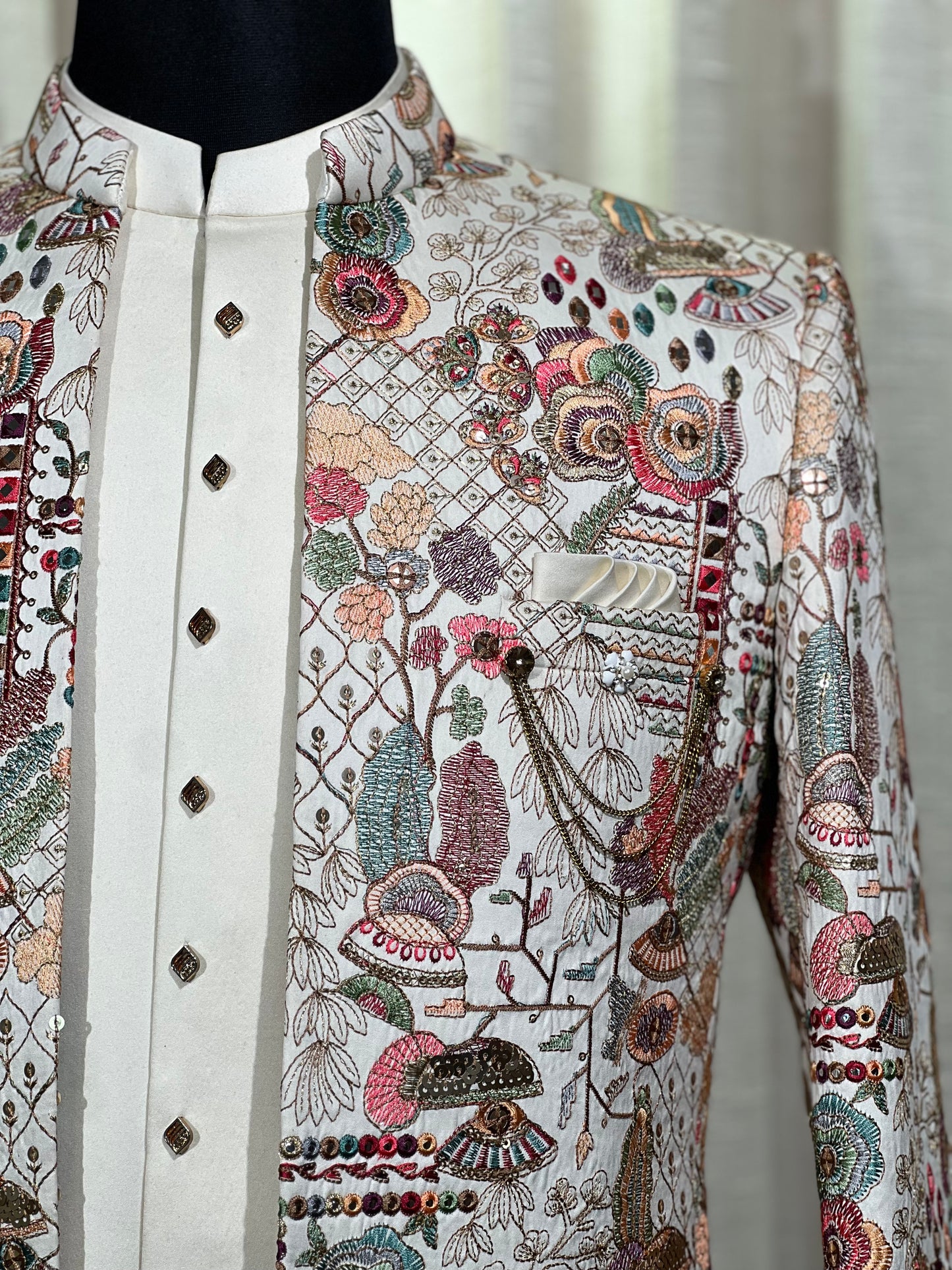 Ivory Jodhpuri Suit with Rich Multicolor Thread Embroidery and Chain Detailing