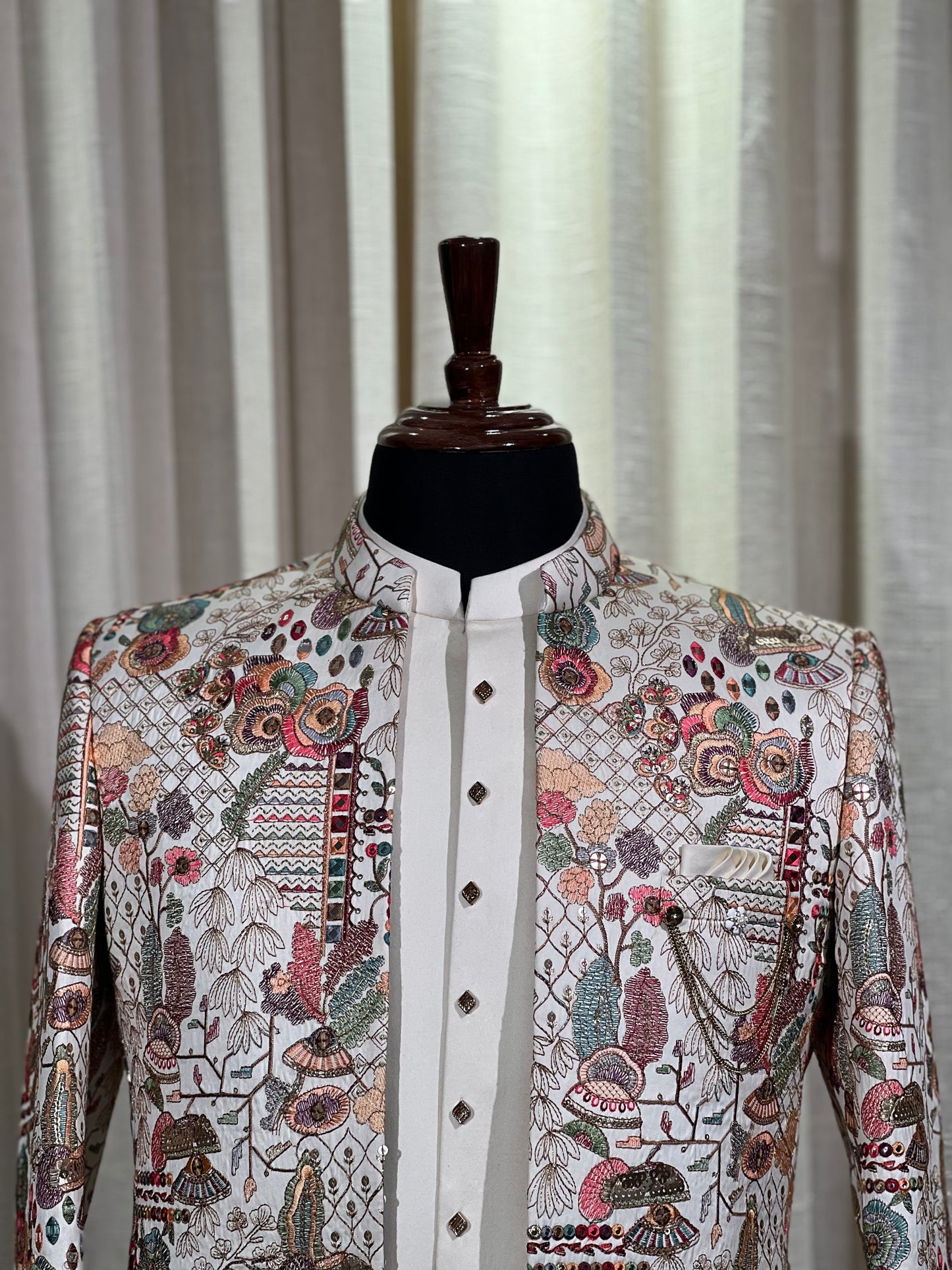 Ivory Jodhpuri Suit with Rich Multicolor Thread Embroidery and Chain Detailing