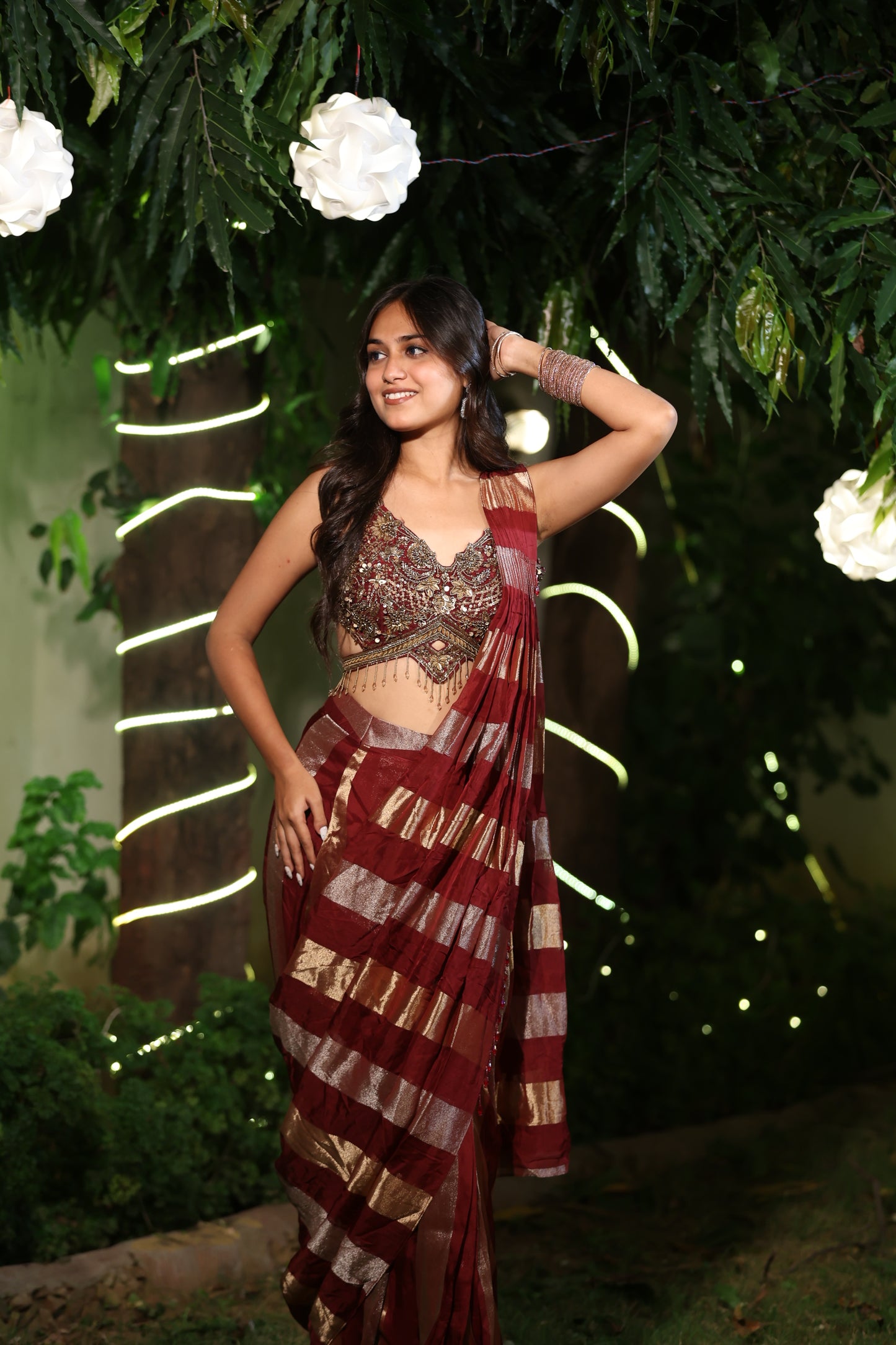 Maroon and Gold Striped Saree with Heavy Embroidered Blouse