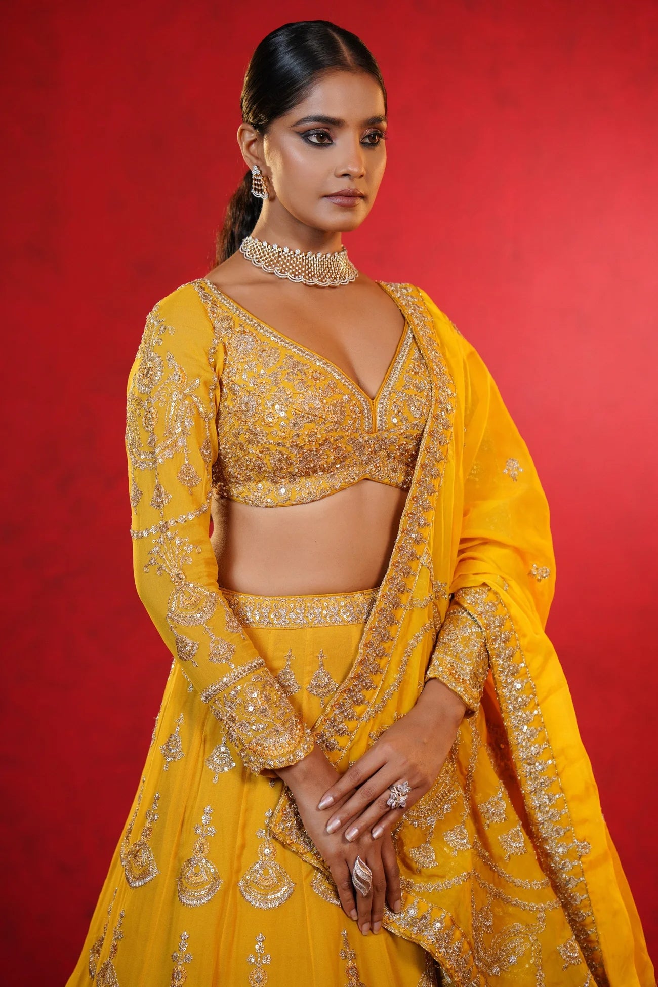 Mustard Yellow Crepe Lehenga with Intricate Zardosi Embroidery