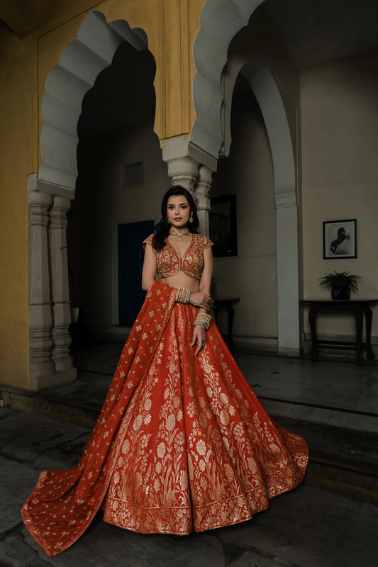 Orange Silk Lehenga Set with Silver Zari Embroidery