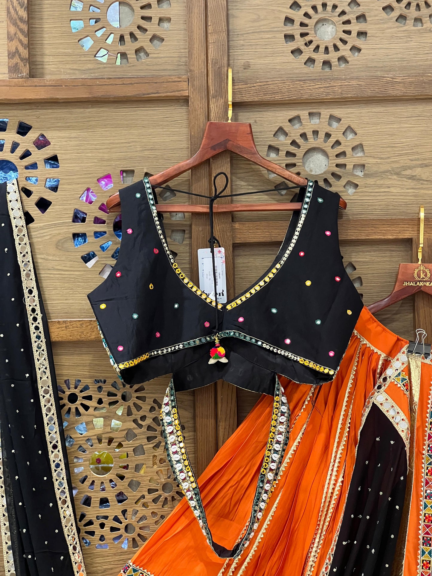 Orange & Black Mirror Work Chaniya Choli with Traditional Patch Border