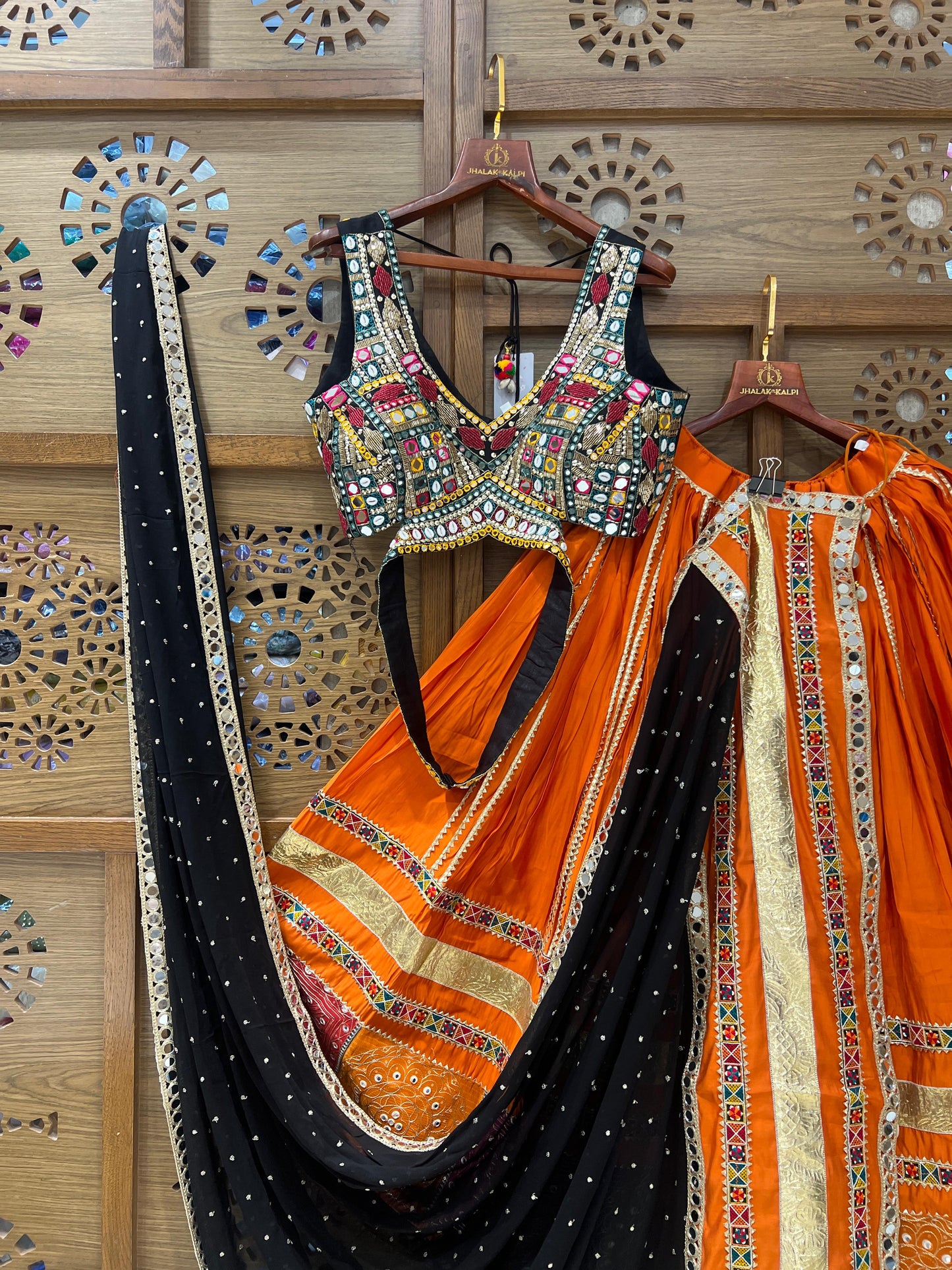 Orange & Black Mirror Work Chaniya Choli with Traditional Patch Border