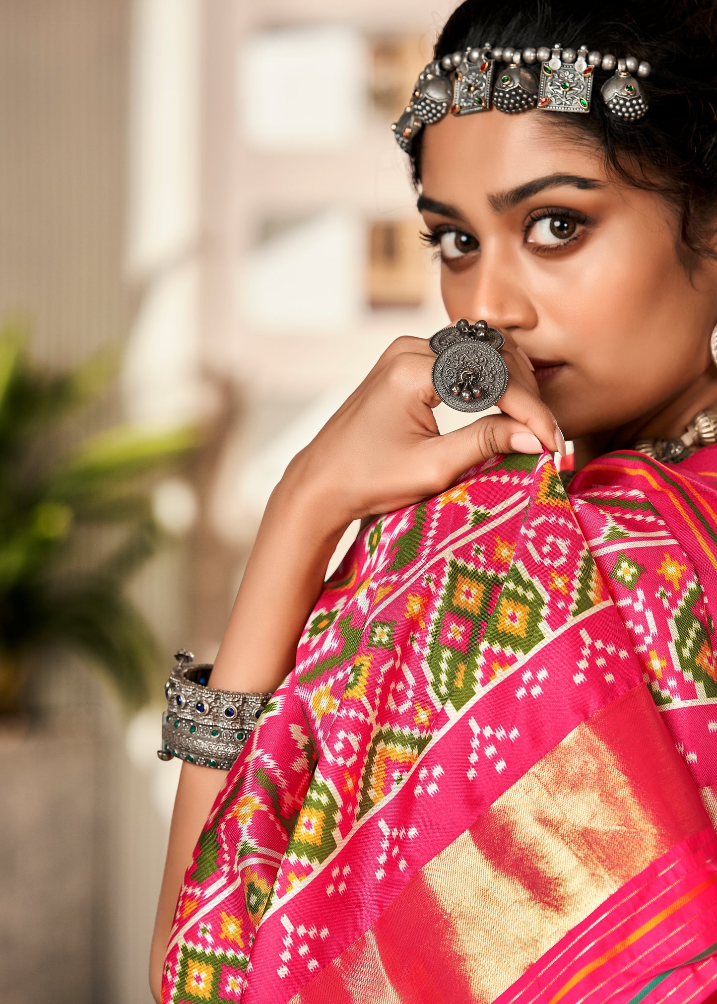 Pink & Green Elora Ajrak Printed Patola Saree