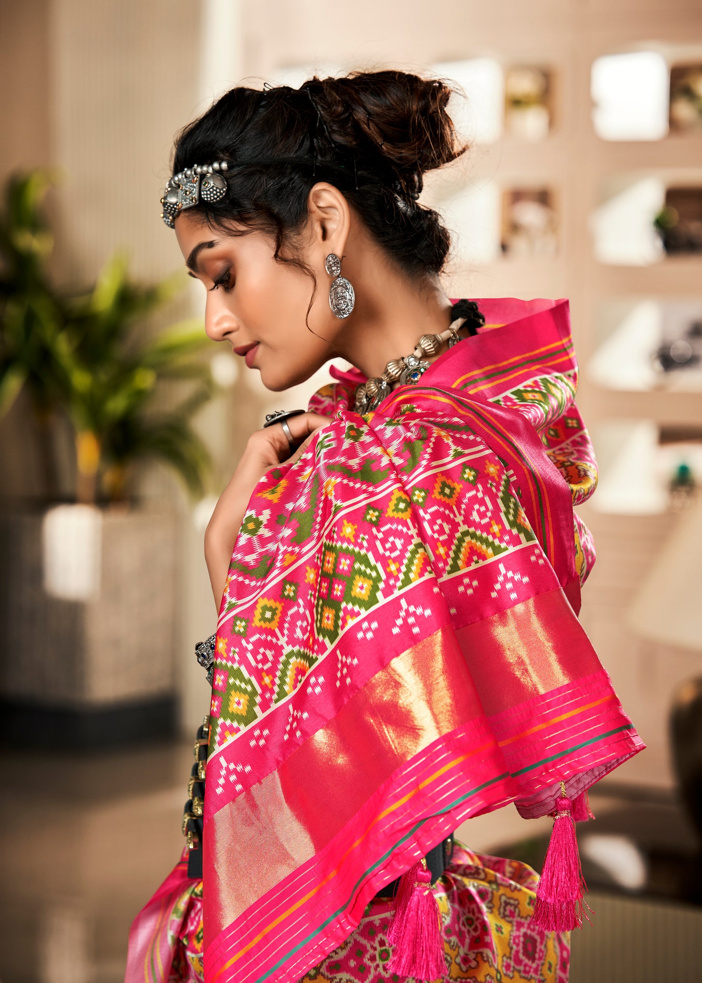 Pink & Green Elora Ajrak Printed Patola Saree