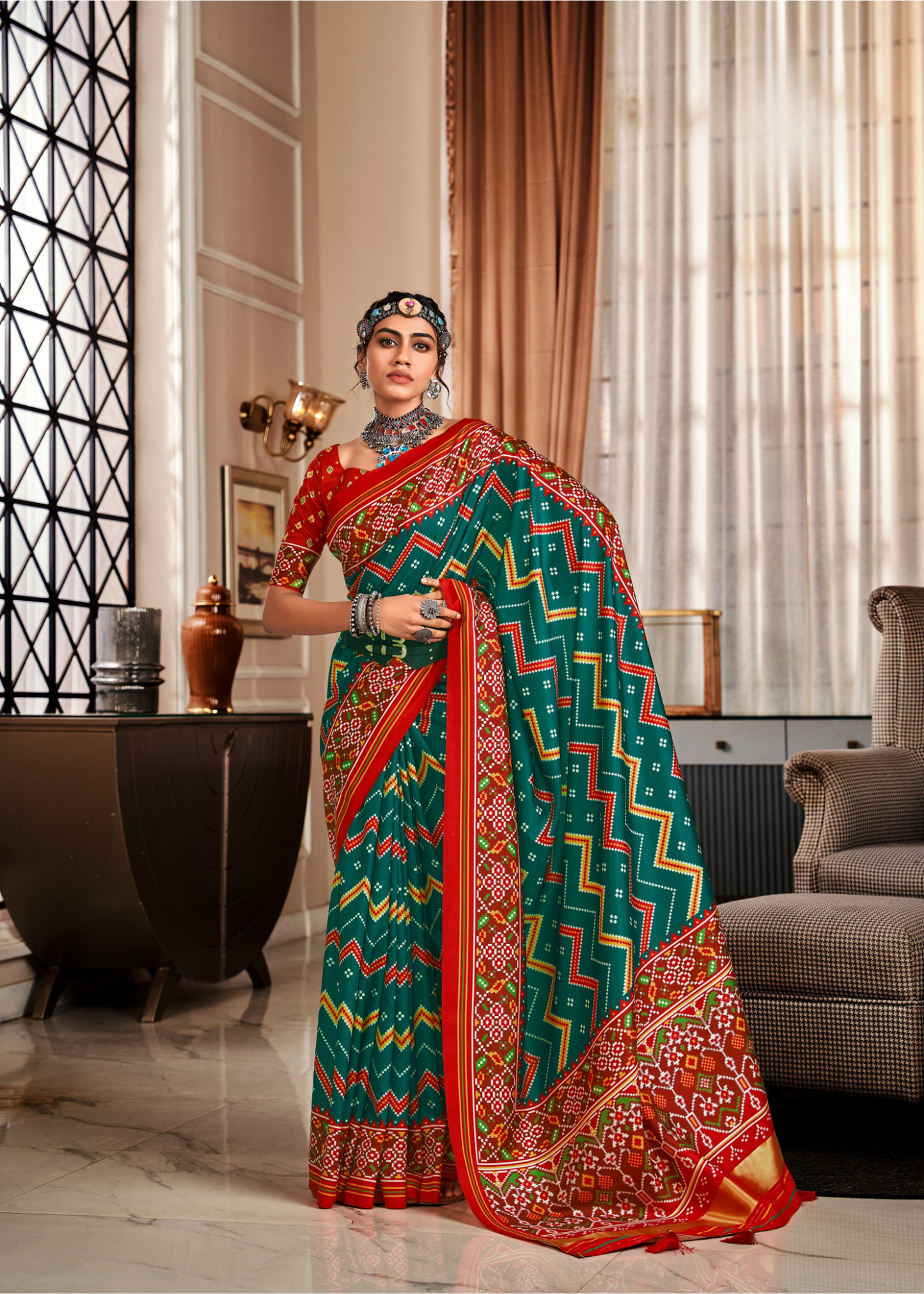 Pleasurable Rama Patola Silk Saree