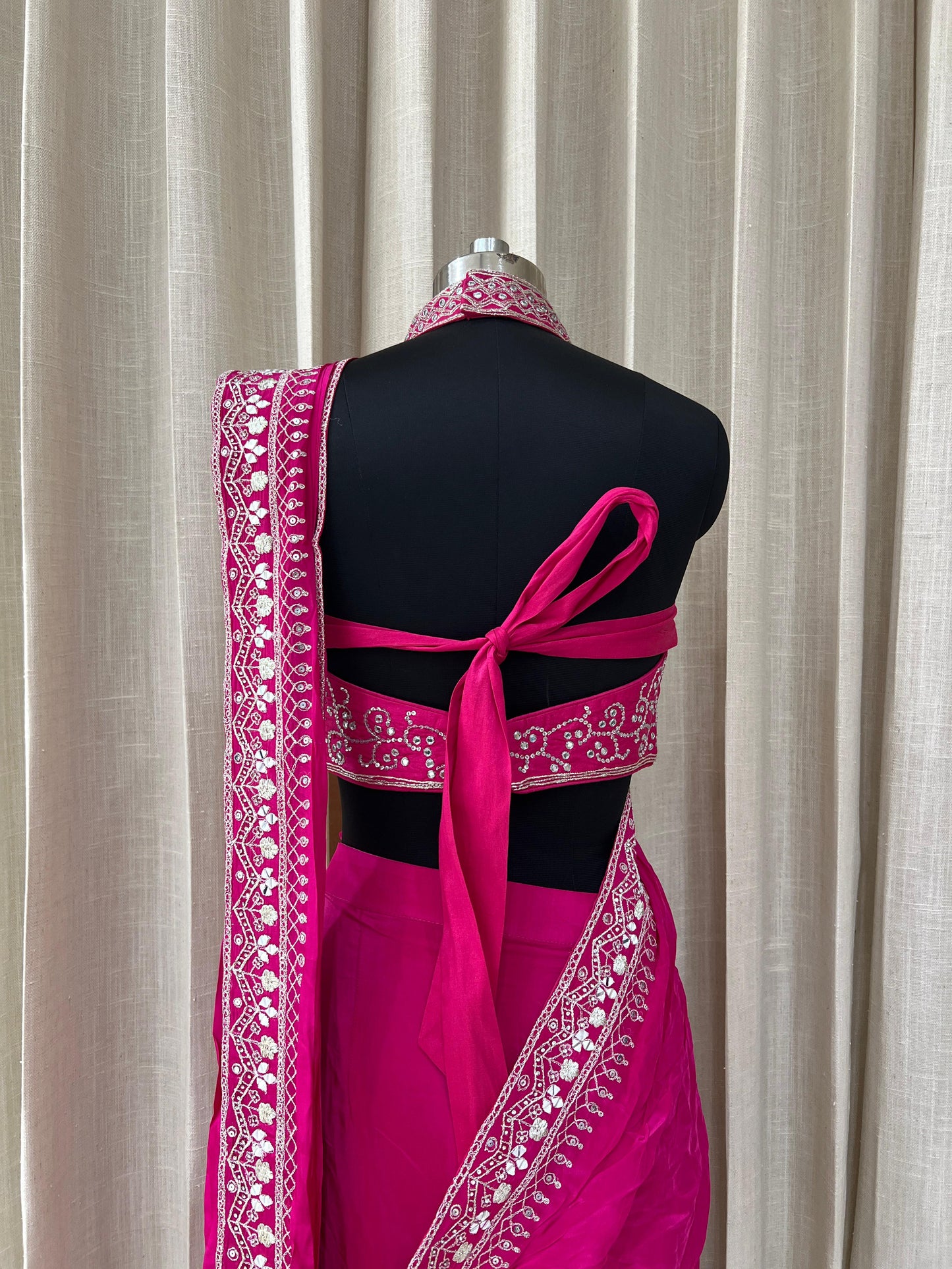 Rani Pink Embroidered Saree with Mirror Work High Neck Blouse