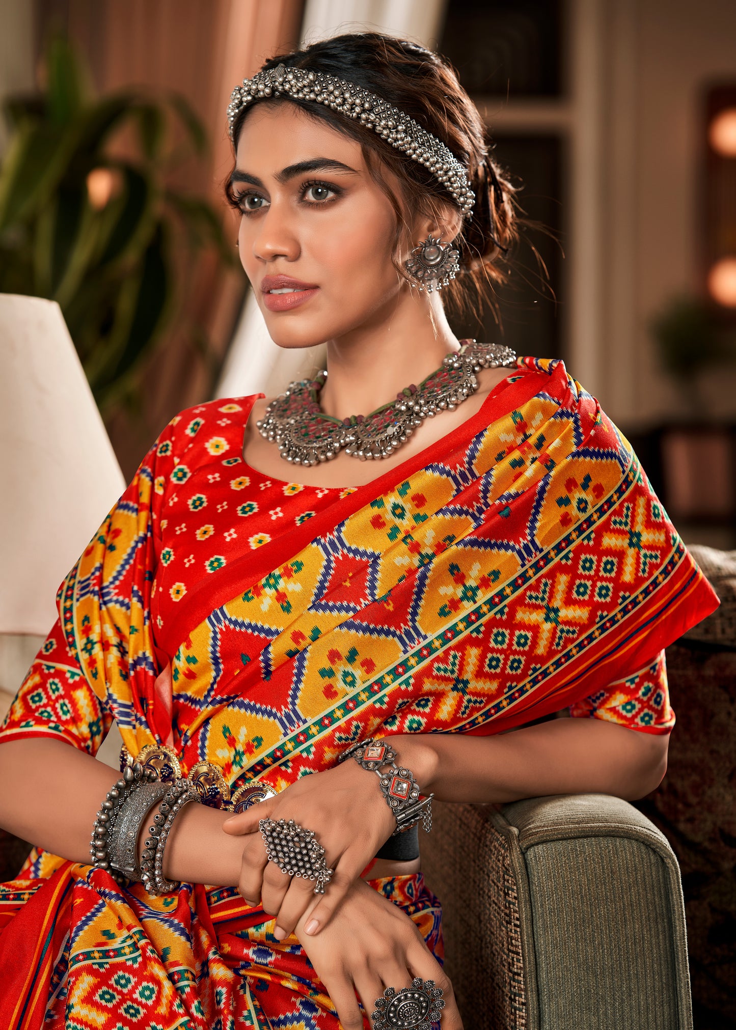 Red and Yellow Elora Ajrak Printed Patola Saree