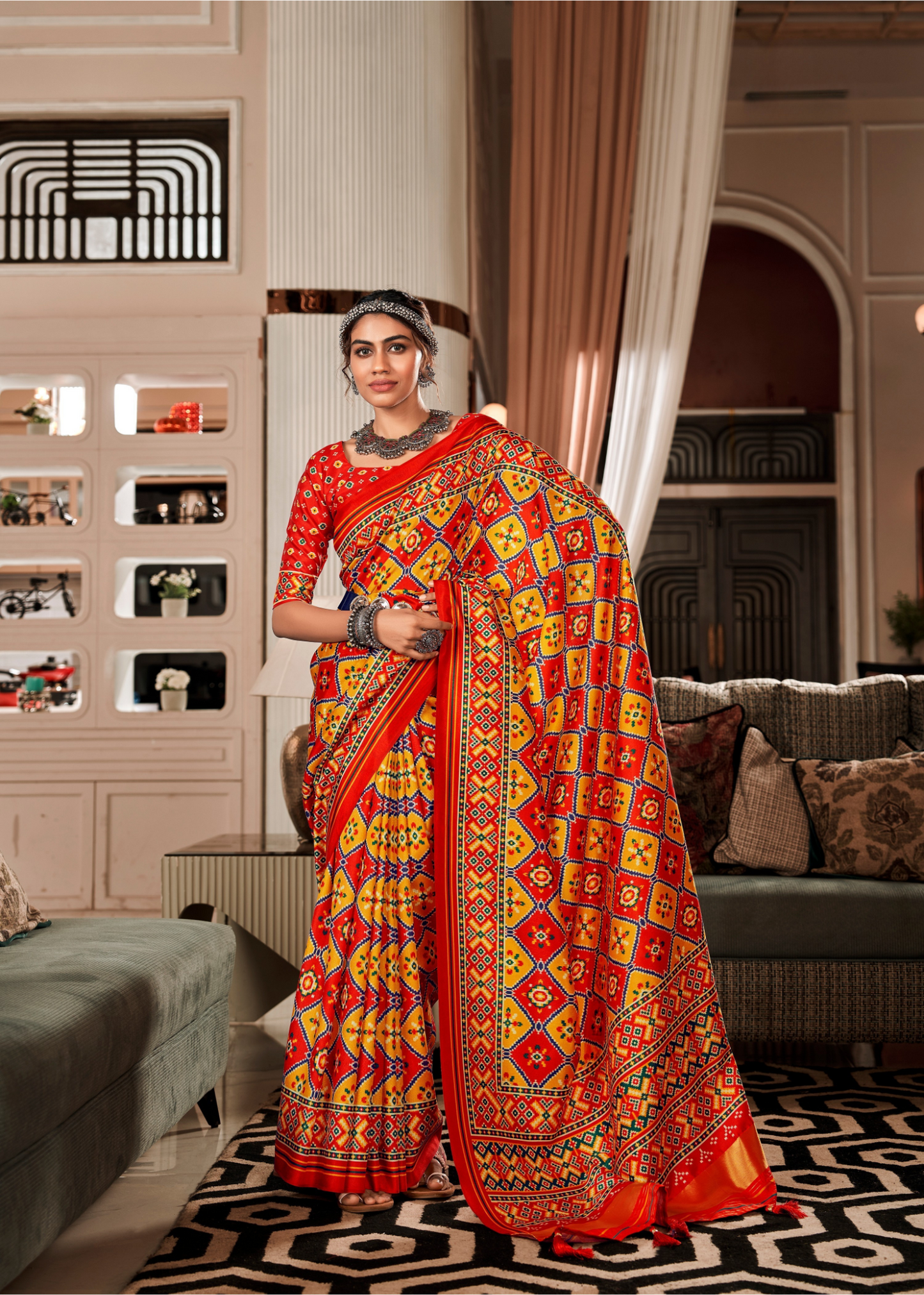Red and Yellow Elora Ajrak Printed Patola Saree