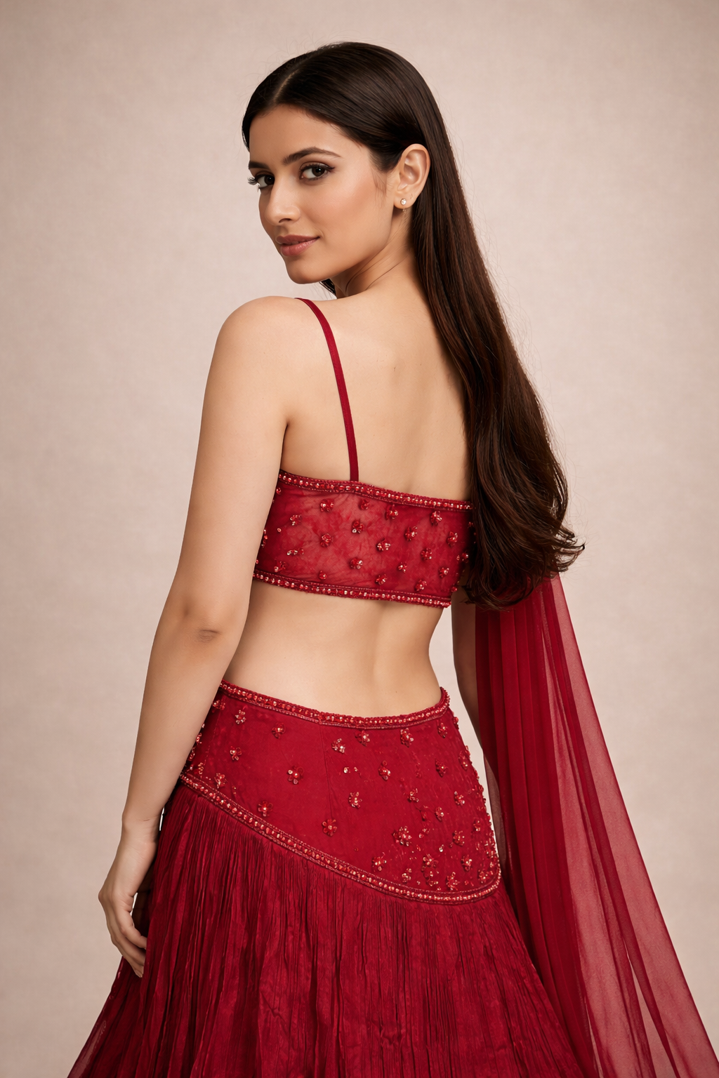 Ruby Red Hand Embroidered Designer Lehenga Choli with Cutwork Waist & Tassel Blouse
