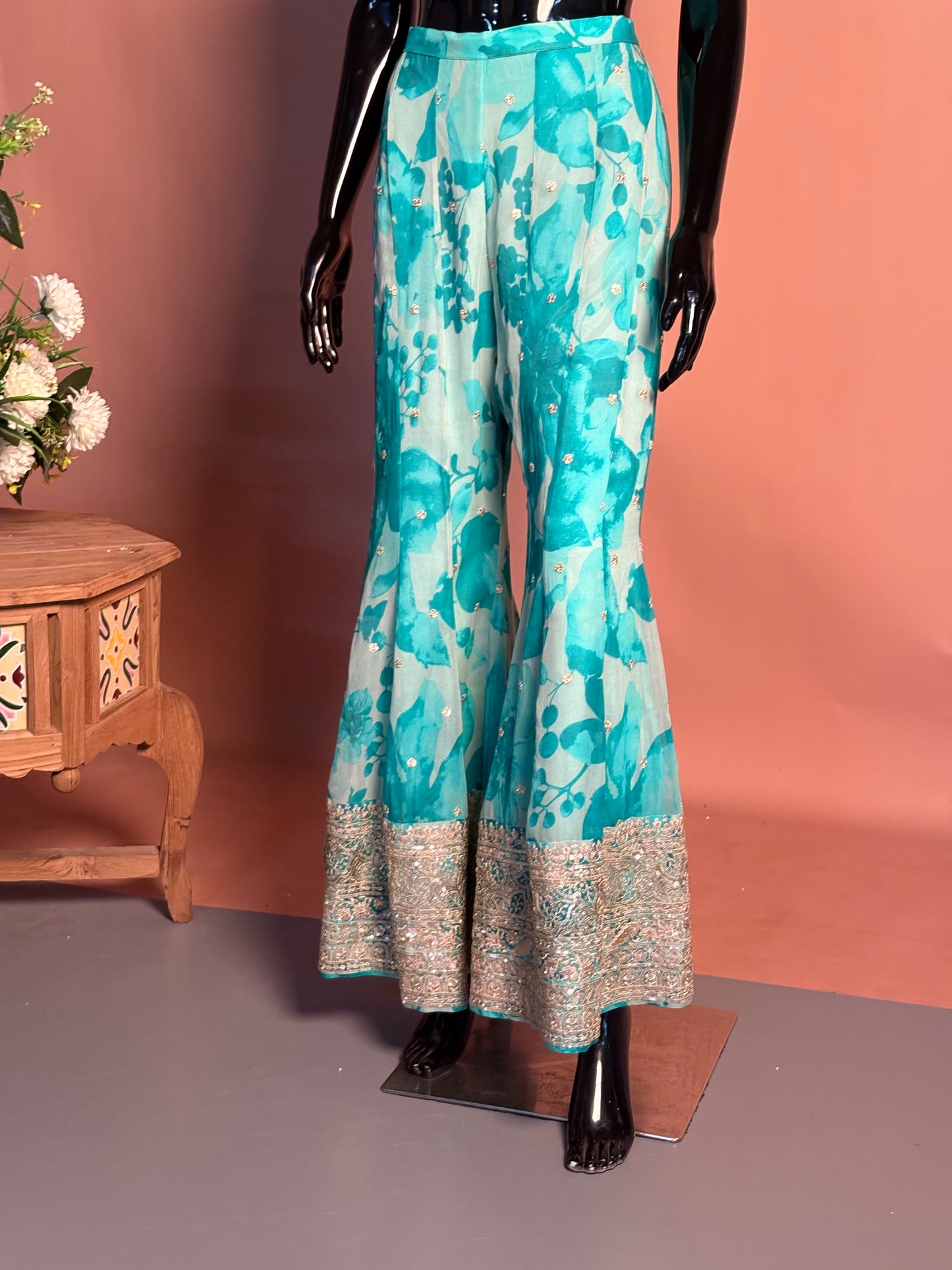 Turquoise Printed Bustier & Palazzo Set with Intricate Hand Embroidered Borders