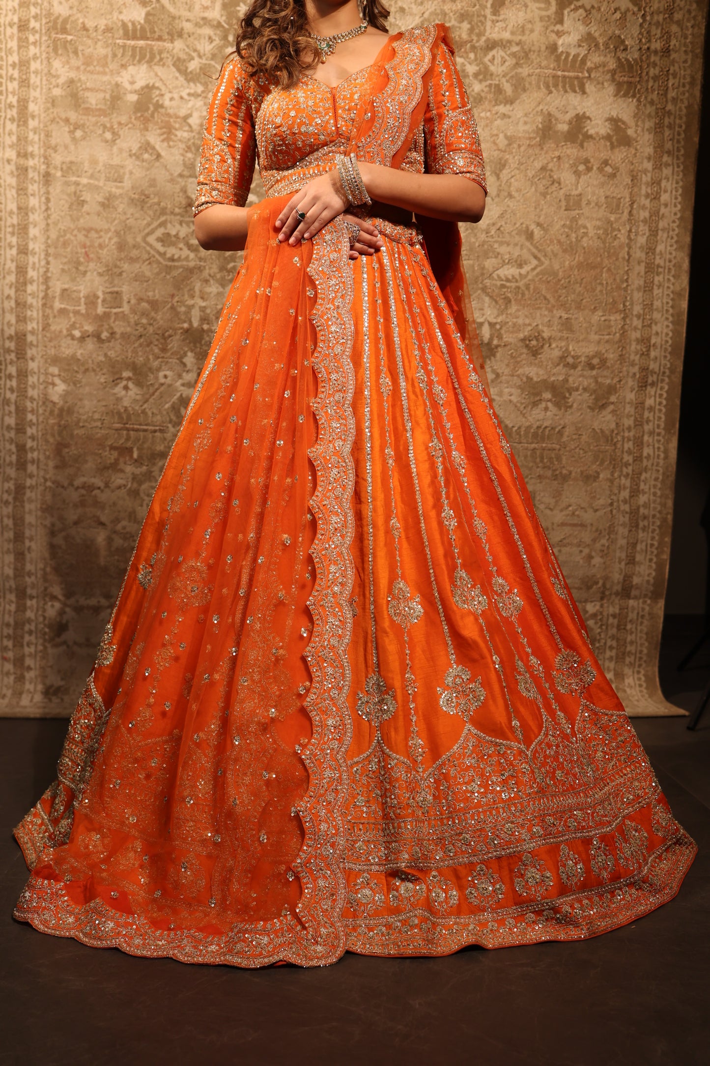 A Silent Promise – Orange Gold Embroidered Bridal Lehenga