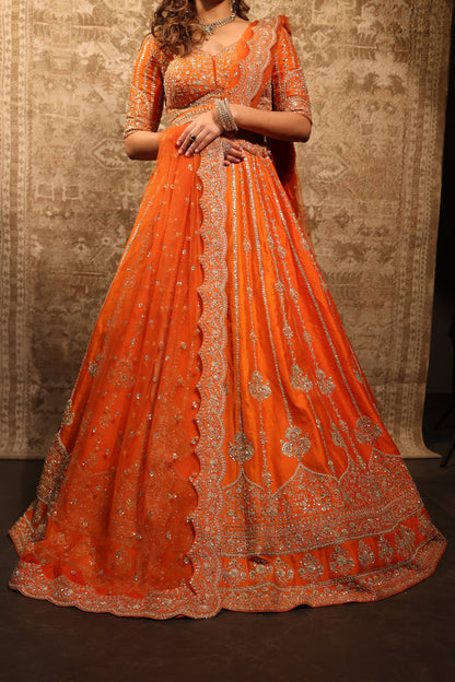 A Silent Promise – Orange Gold Embroidered Bridal Lehenga