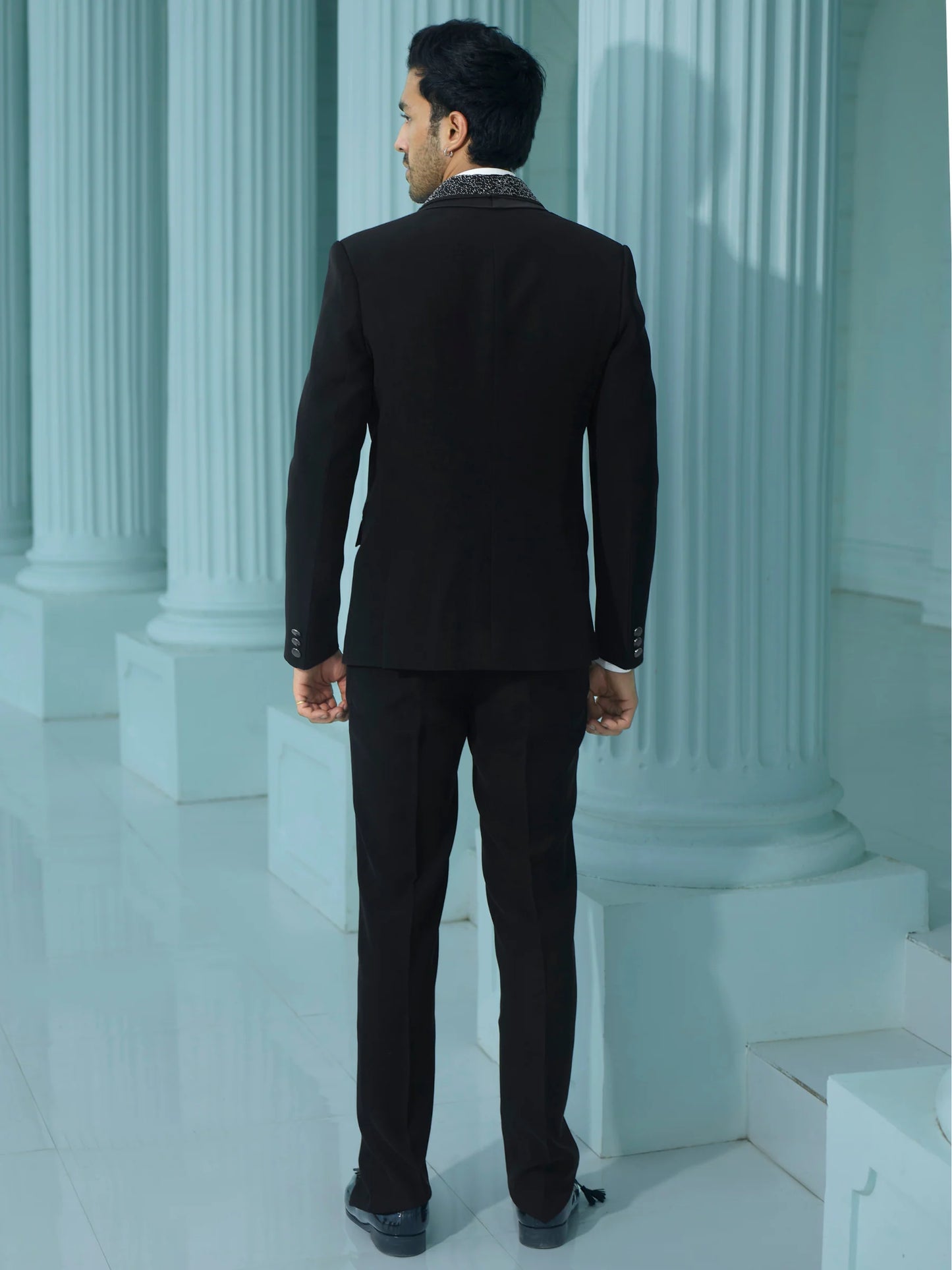 Sleek Black Suit with Embellished Lapel