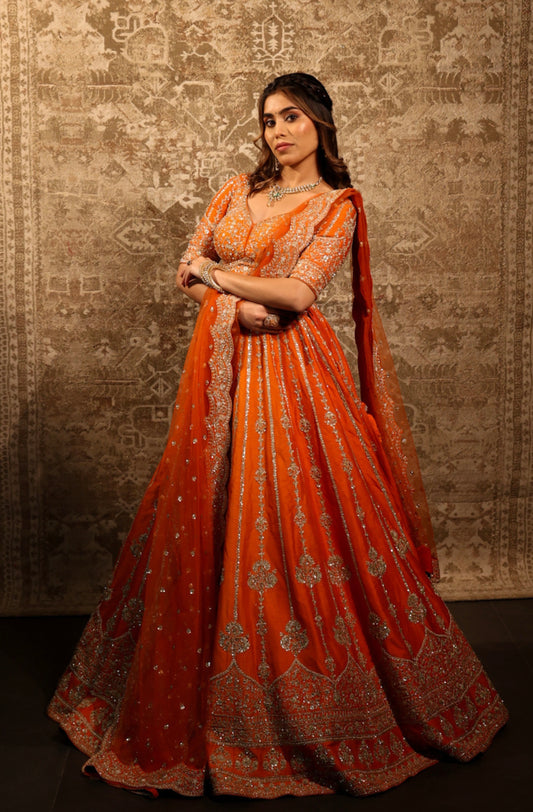 A Silent Promise – Orange Gold Embroidered Bridal Lehenga