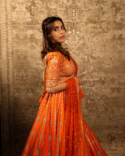 A Silent Promise – Orange Gold Embroidered Bridal Lehenga