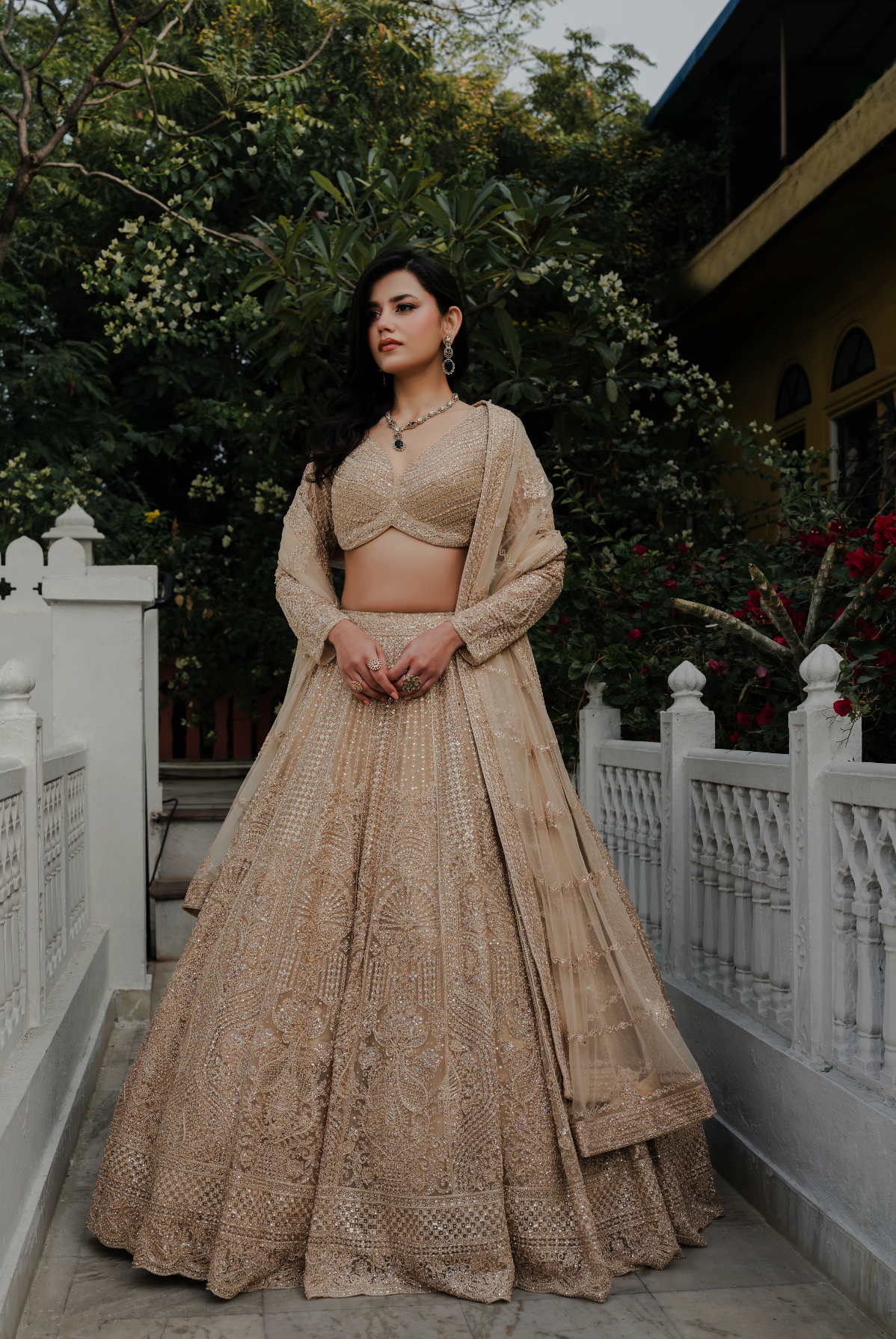 Beige Net Lehenga Choli with Stone and Pearl Embroidery