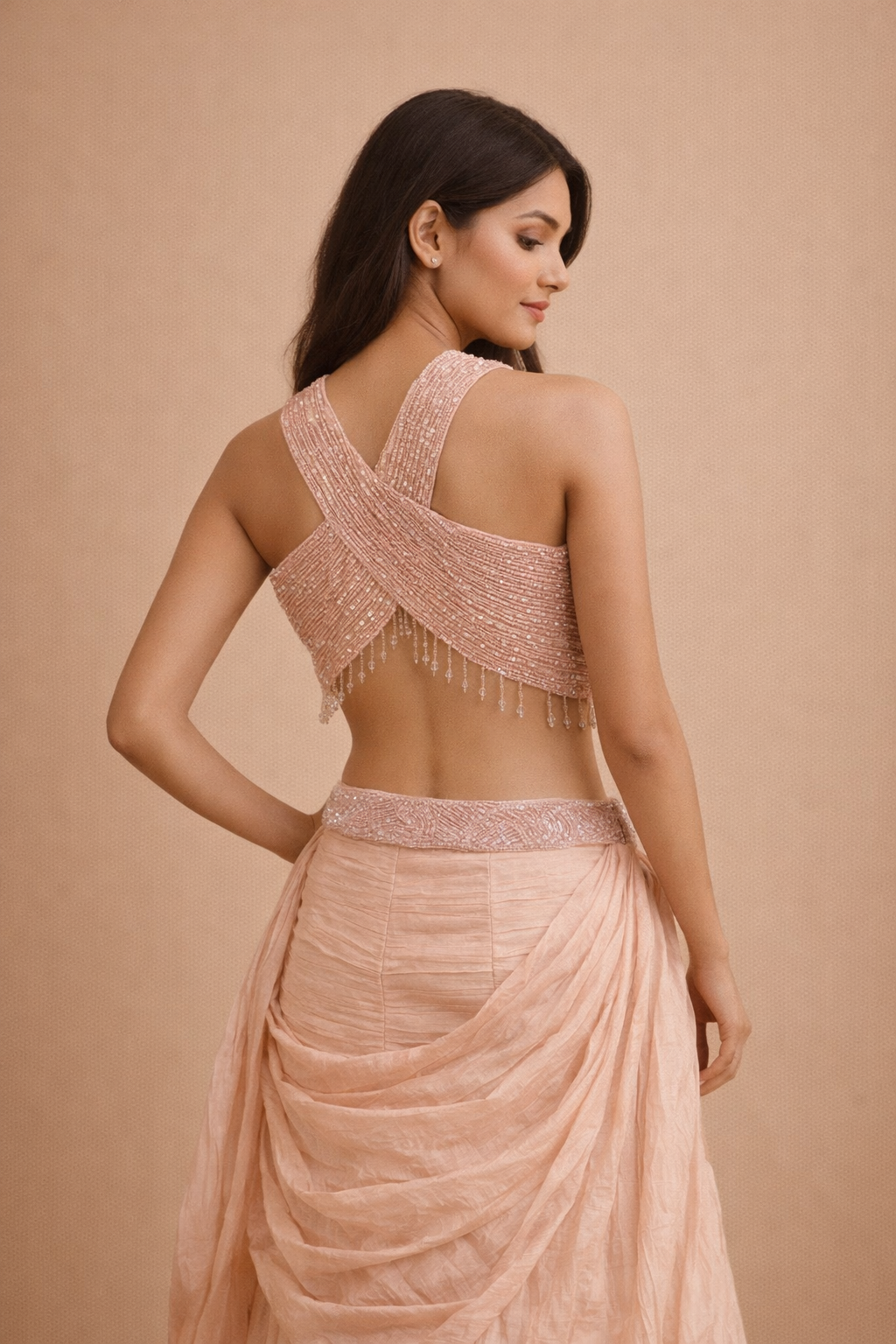 Blush Peach Embroidered Halter Neck Lehenga Choli with Draped Skirt & Sequin Work
