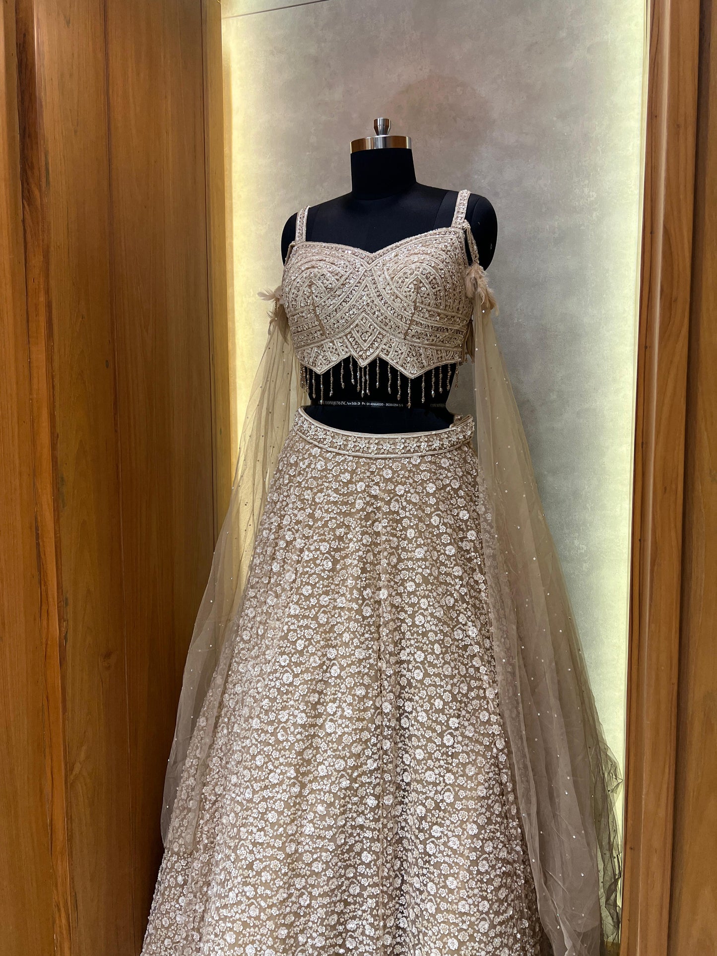 Champagne Gold Embroidered Lehenga with Beaded Blouse and Net Cape Dupatta