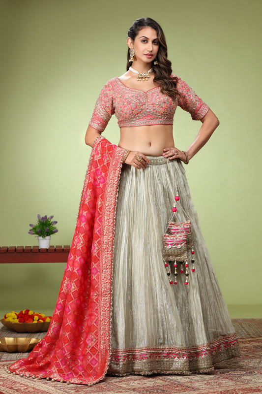 Cream & Pink Net Sangeet Lehenga With Embroidered Blouse