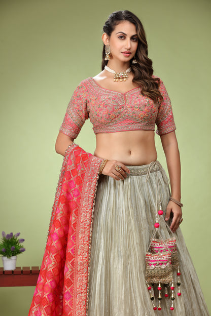 Cream & Pink Net Sangeet Lehenga With Embroidered Blouse