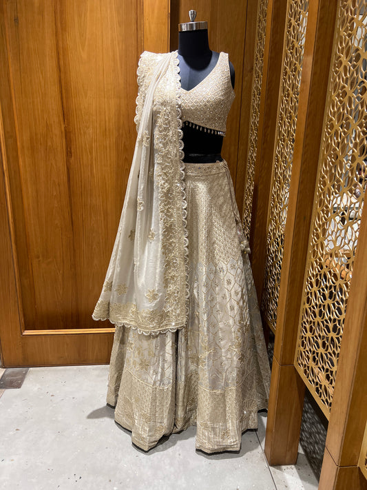 Elegant Ivory and Gold Embroidered Silk Lehenga Set
