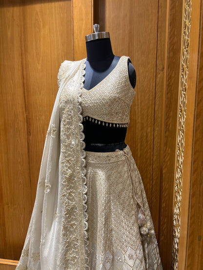 Elegant Ivory and Gold Embroidered Silk Lehenga Set