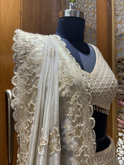 Elegant Ivory and Gold Embroidered Silk Lehenga Set