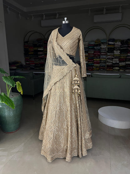 Golden Heavy Embroidered Georgette Lehenga Choli with Net Dupatta