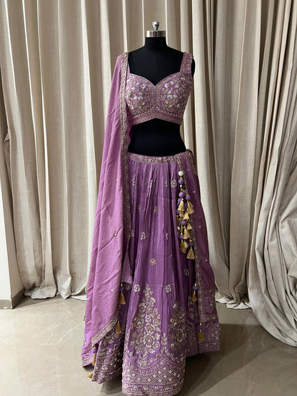 Lavender Embroidered Lehenga Choli with Mirror and Tassel Detailing Description: