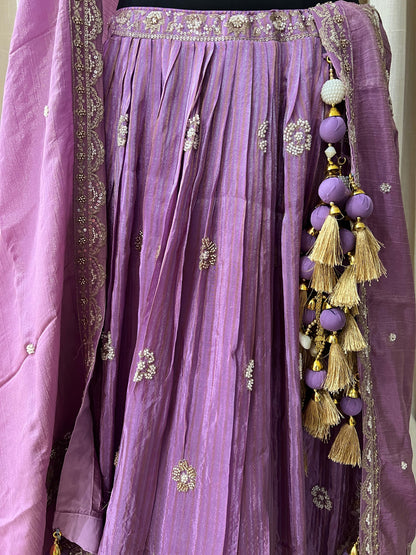 Lavender Embroidered Lehenga Choli with Mirror and Tassel Detailing Description: