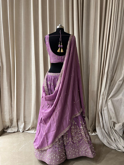 Lavender Embroidered Lehenga Choli with Mirror and Tassel Detailing Description: