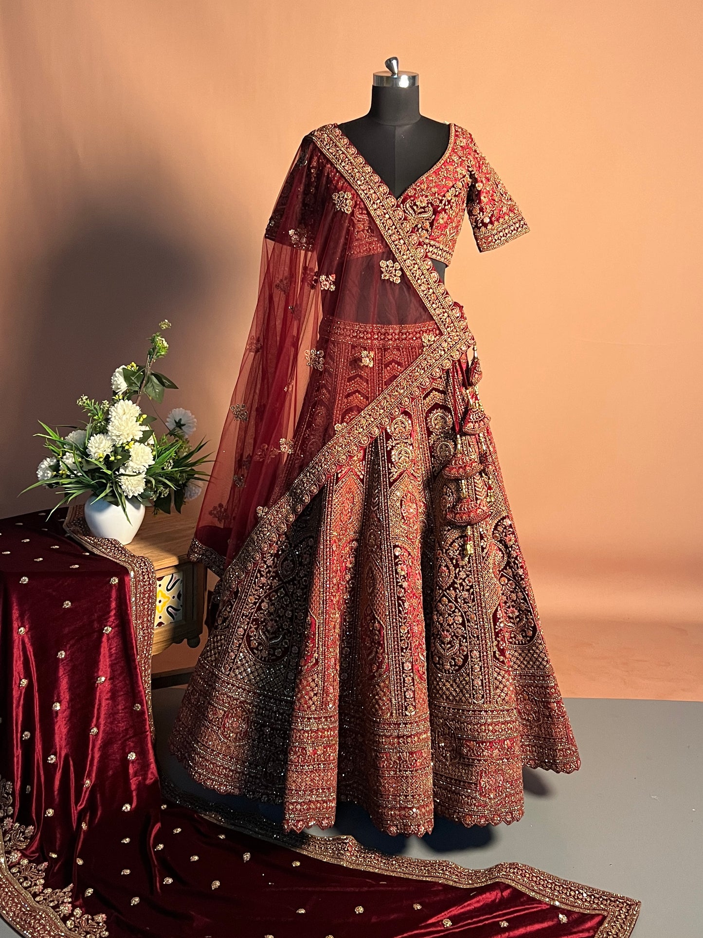 Maroon Heavily Embroidered Velvet Bridal Lehenga with Kashmiri Motifs