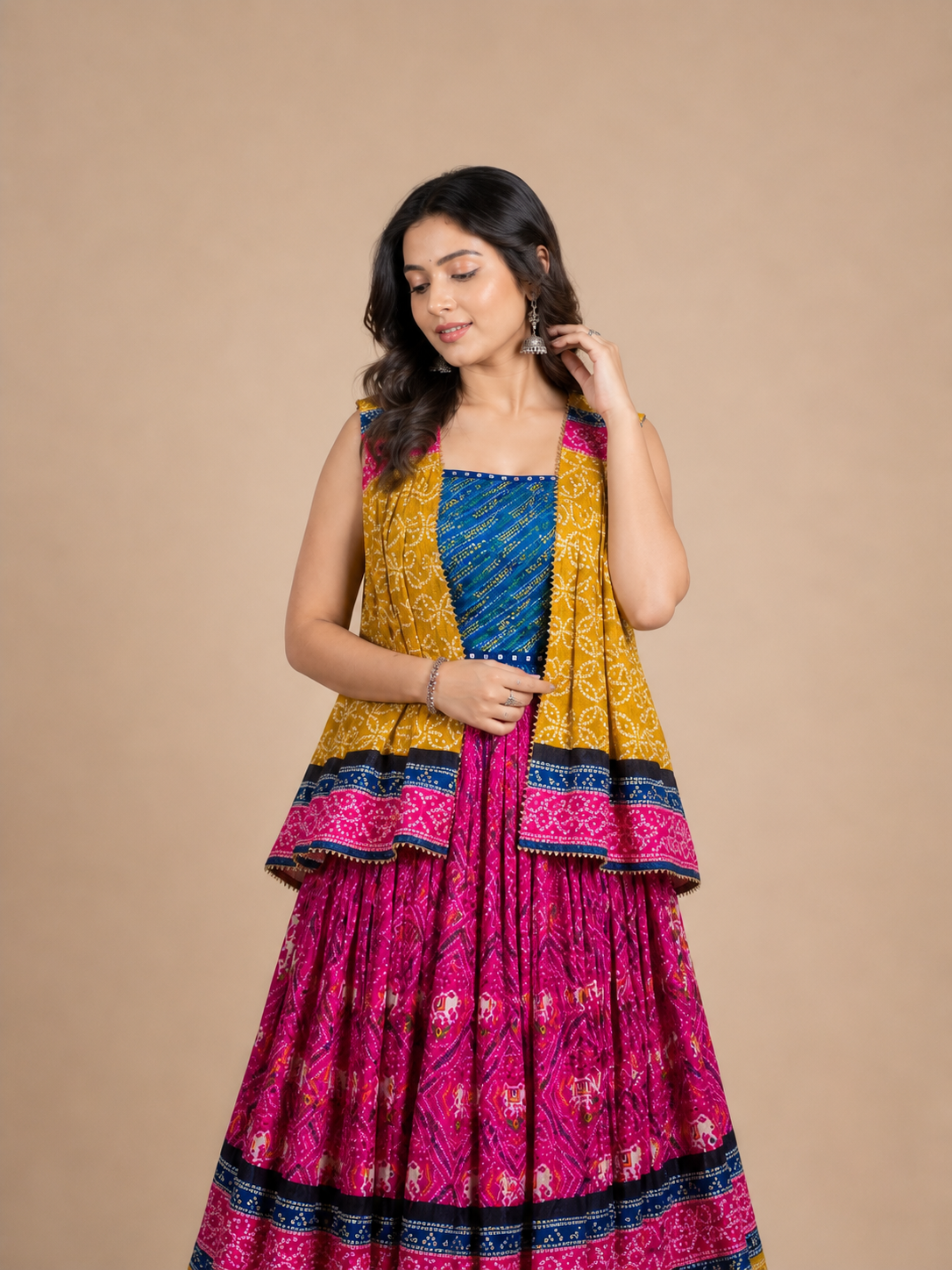 Mustard Yellow Bandhani Jacket Style Chaniya Choli with Rani Pink Lehenga and Blue Blouse