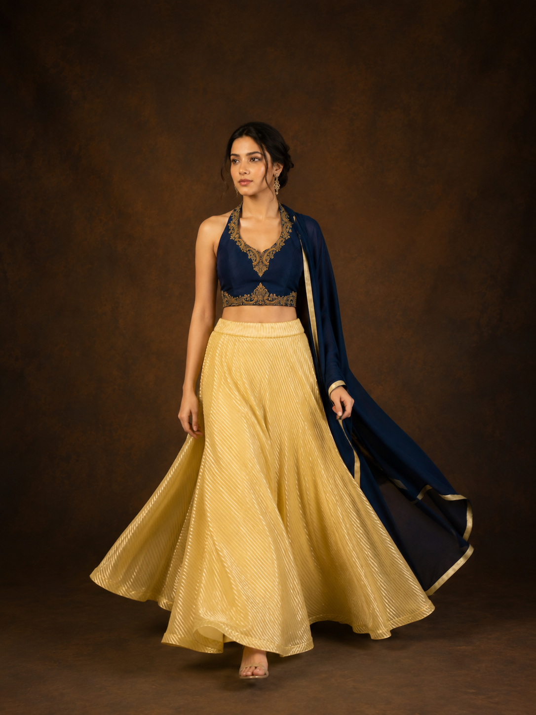 Navy Blue Embroidered Halter Blouse with Golden Crush Tissue Lehenga