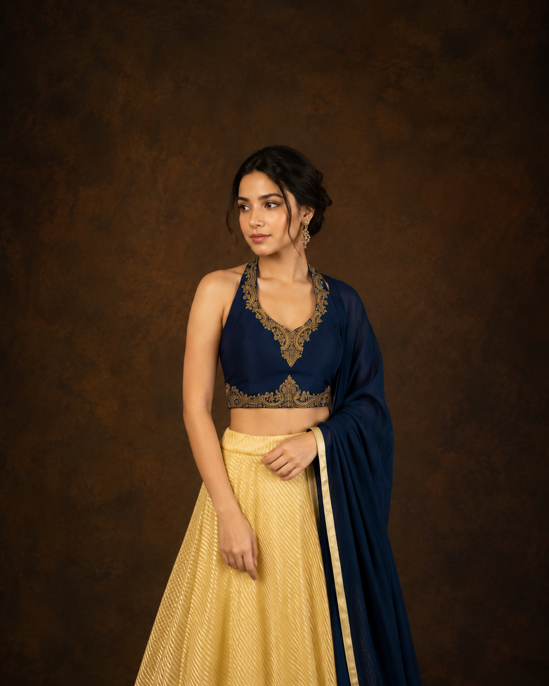 Navy Blue Embroidered Halter Blouse with Golden Crush Tissue Lehenga