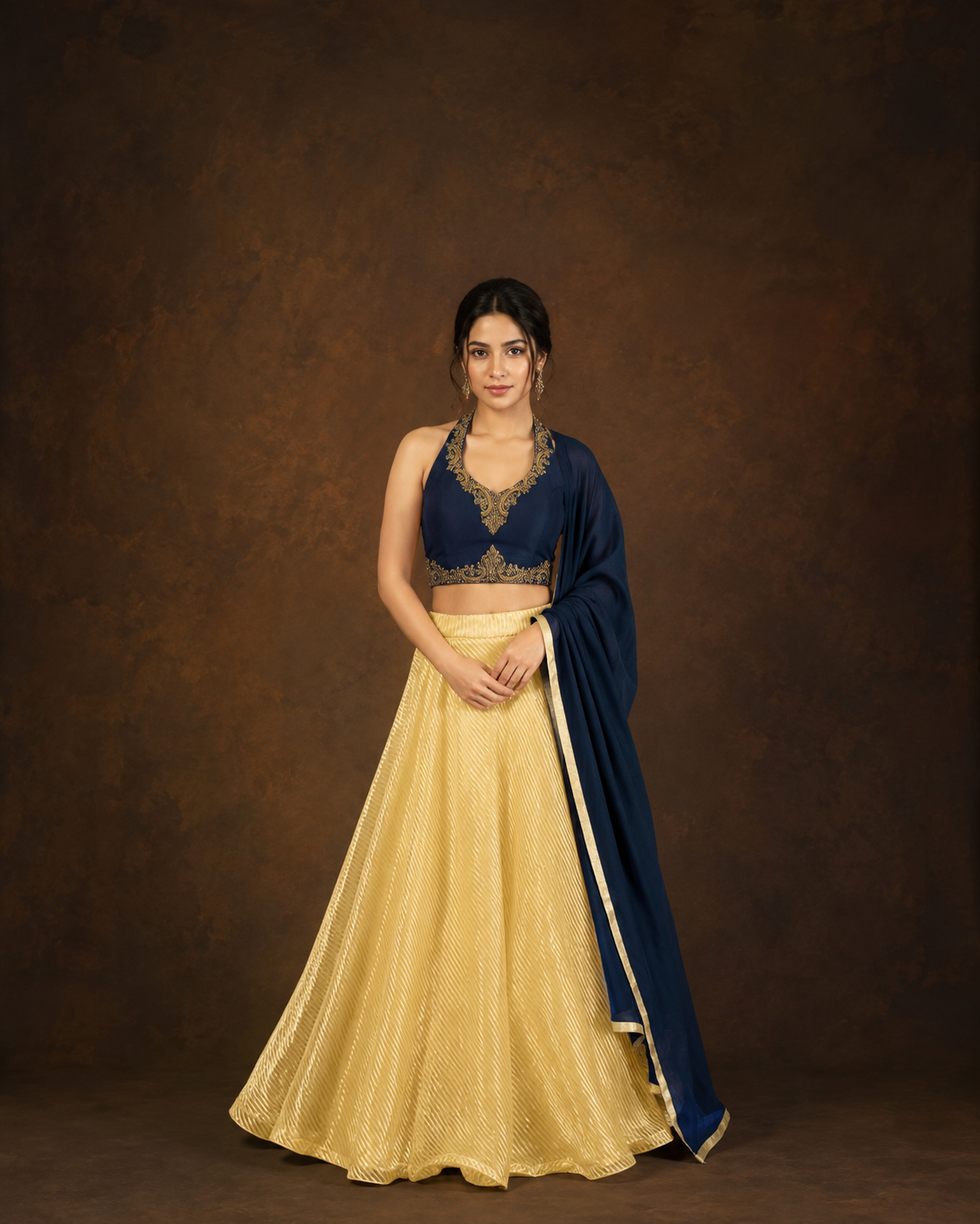 Navy Blue Embroidered Halter Blouse with Golden Crush Tissue Lehenga
