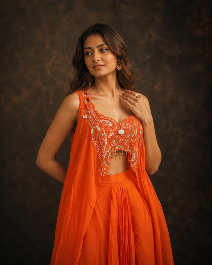 Orange Embellished Indo Western Drape Palazzo Set with Hand Embroidered Crop Top and Flowing Cape