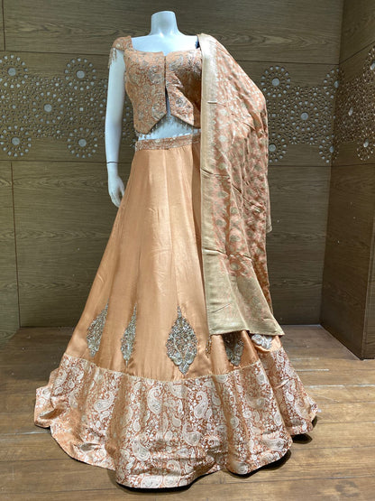 Peach Zari Woven Lehenga Set with Paisley Embroidered Blouse and Banarasi Border