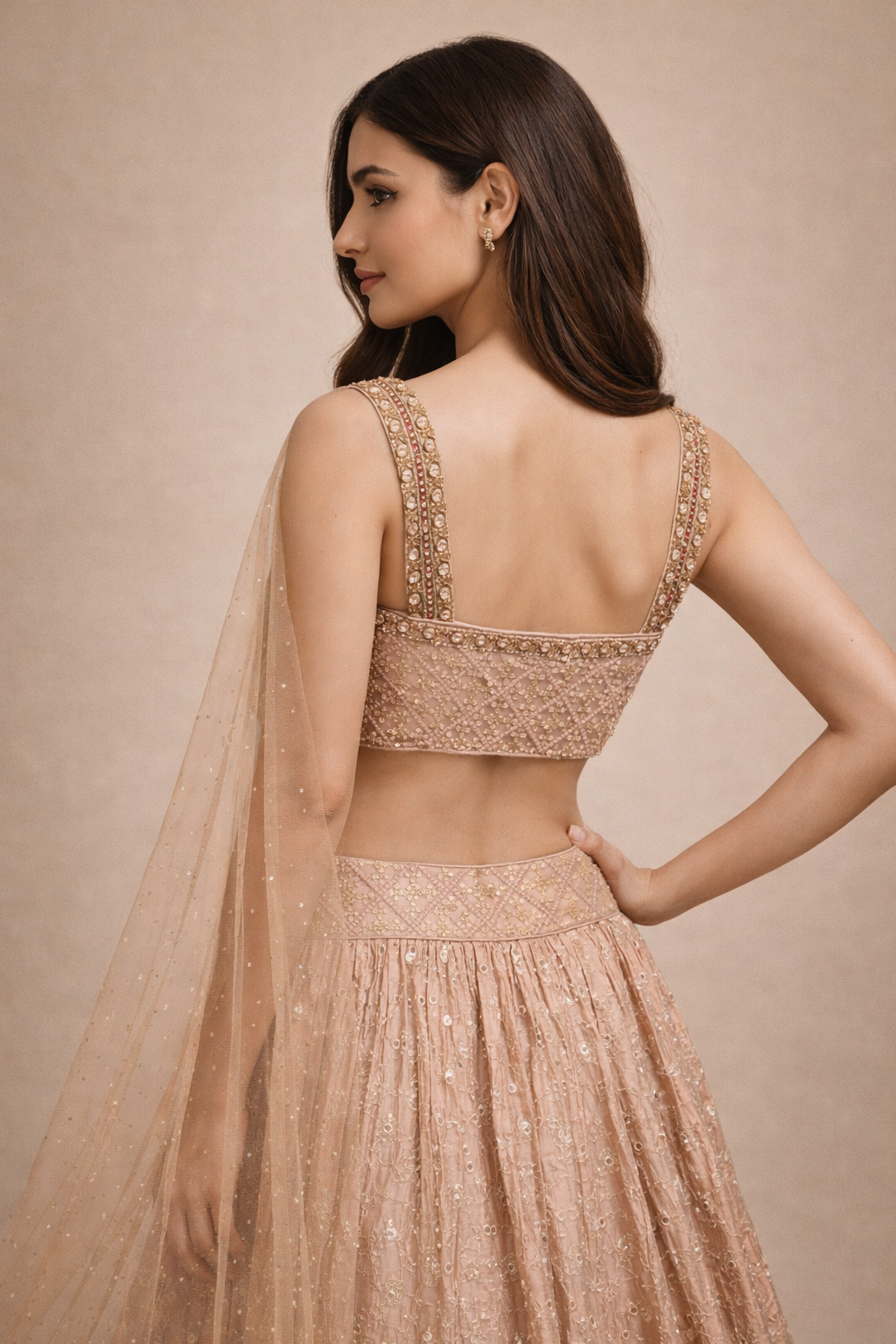 Peach Beige and Gold Embroidered Designer Lehenga Choli with Net Dupatta