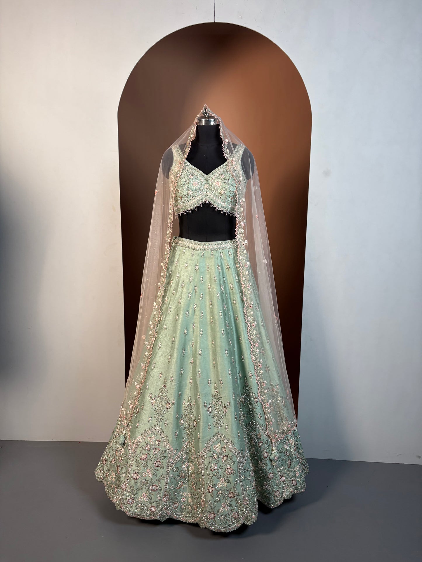 Pistachio Green Heavy Embroidered Net Lehenga Set
