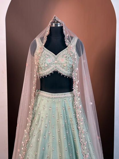 Pistachio Green Heavy Embroidered Net Lehenga Set
